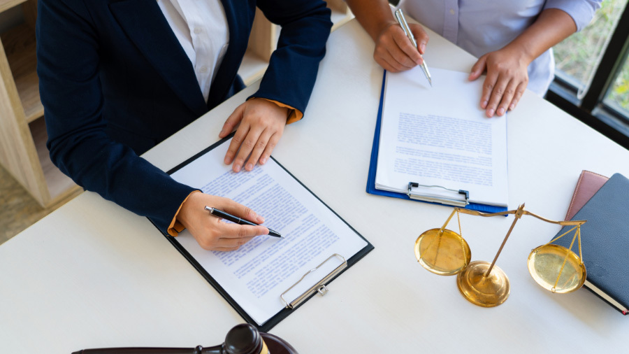 Top Defender Resorts timeshare cancellation company speaking with client.